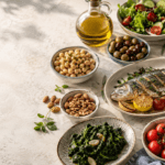 Mediterranean diet foods with olive oil, vegetables, fish and whole grains