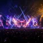 Concert stage with dramatic lighting, large crowd silhouette, and award show atmosphere representing 2026 music trends