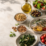Mediterranean diet foods with olive oil, vegetables, fish and whole grains