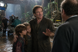Robin Williams with Jumanji child stars Kirsten Dunst and Bradley Pierce