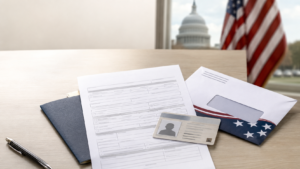 Illustration of a voter registration form, photo identification card, and mail ballot envelope.