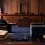 Editorial illustration of an empty federal courtroom representing the alien terrorist removal court